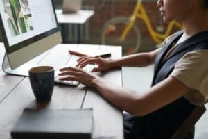 employee working alone on a table with coffee