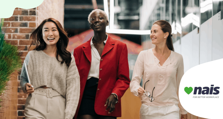 Three woman smiling and walking